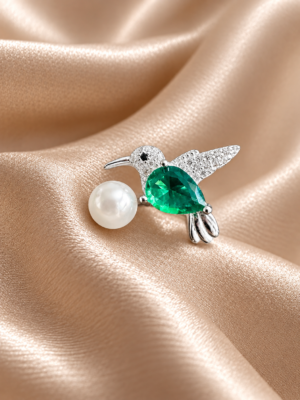 2B92C306-532D-4DE4-A18B-CE9A5D1E1C5D Anillo Adaptable Colibrí Esmeralda con Perla