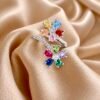 9E992081-859C-451F-9FB7-823C3ABF889A Anillo Adaptable Flor Arcoíris