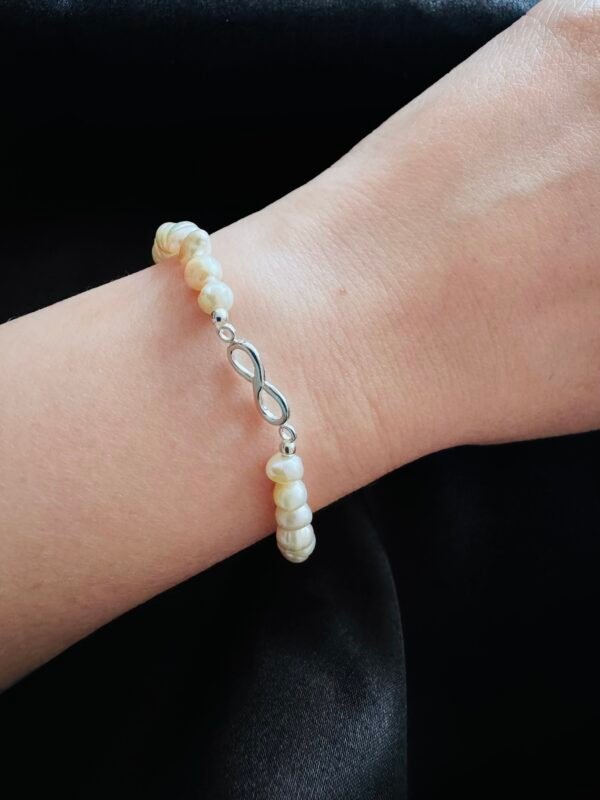 Pulsera de Perlas con Infinito