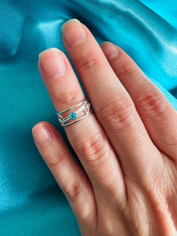 Anillo Midi Espiral Circón Celeste