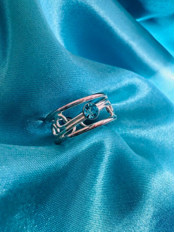 Anillo Midi Espiral Circón Celeste