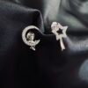 Aros Desigual Astronauta en la Luna y Estrella Fugaz