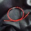 Pulsera de Hilo Rojo Nudo de Bruja y Esferas