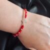 Pulsera de Hilo Rojo Nudo de Bruja y Esferas