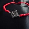 Pulsera de Hilo Rojo y Nudo de Bruja