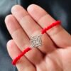 Pulsera de Hilo Rojo y Nudo de Bruja